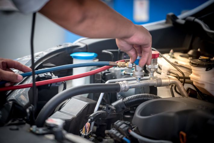 Fluid being poured into car