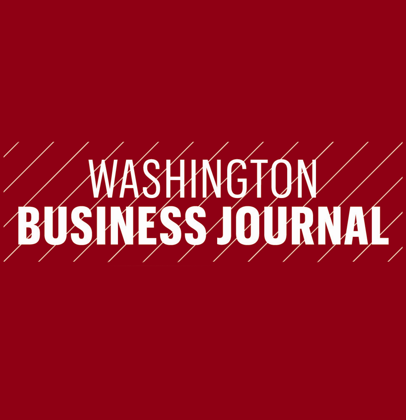The logo for the washington business journal is on a red background