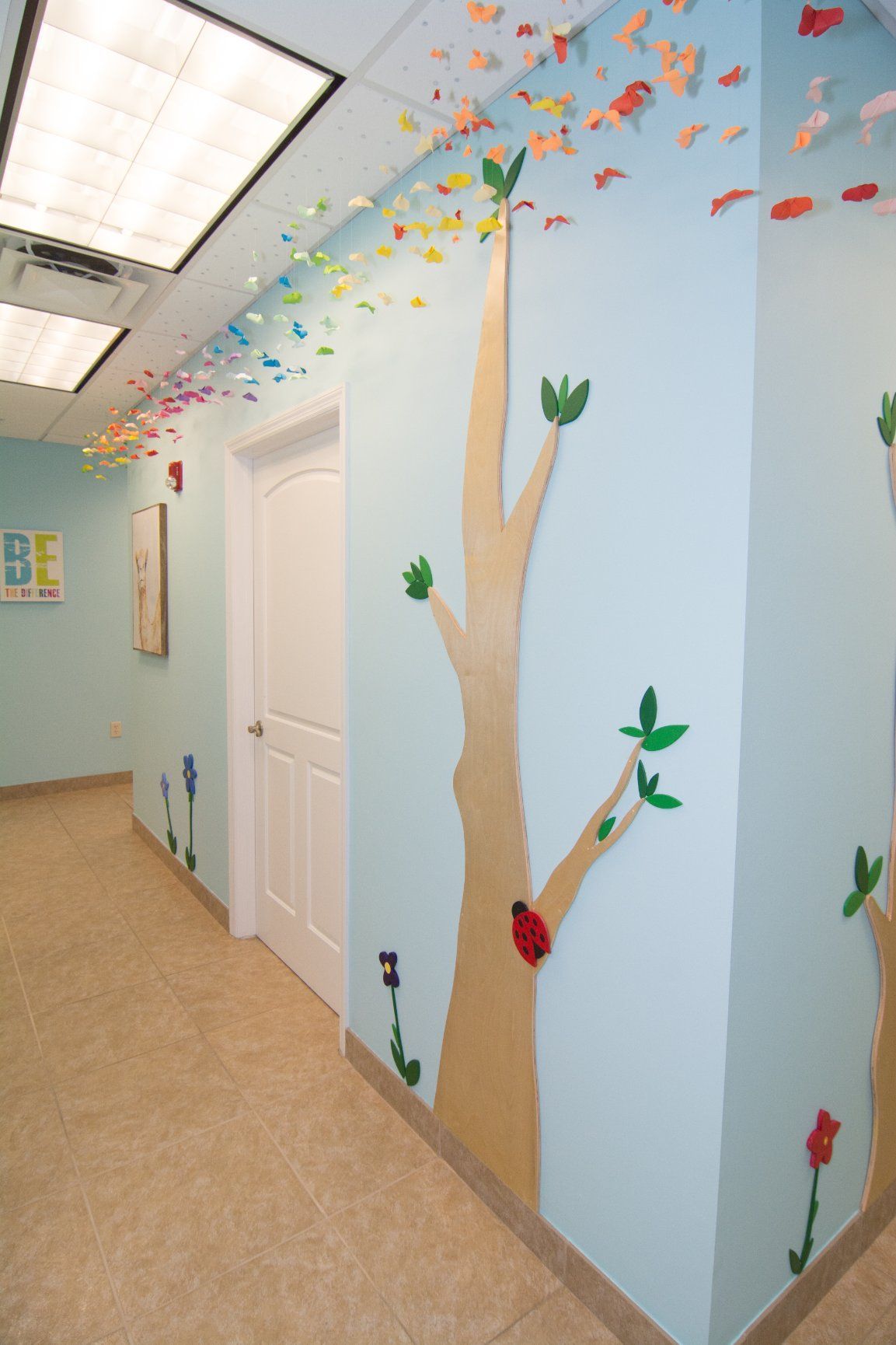 photo of a white door of a consultation room from the hallway