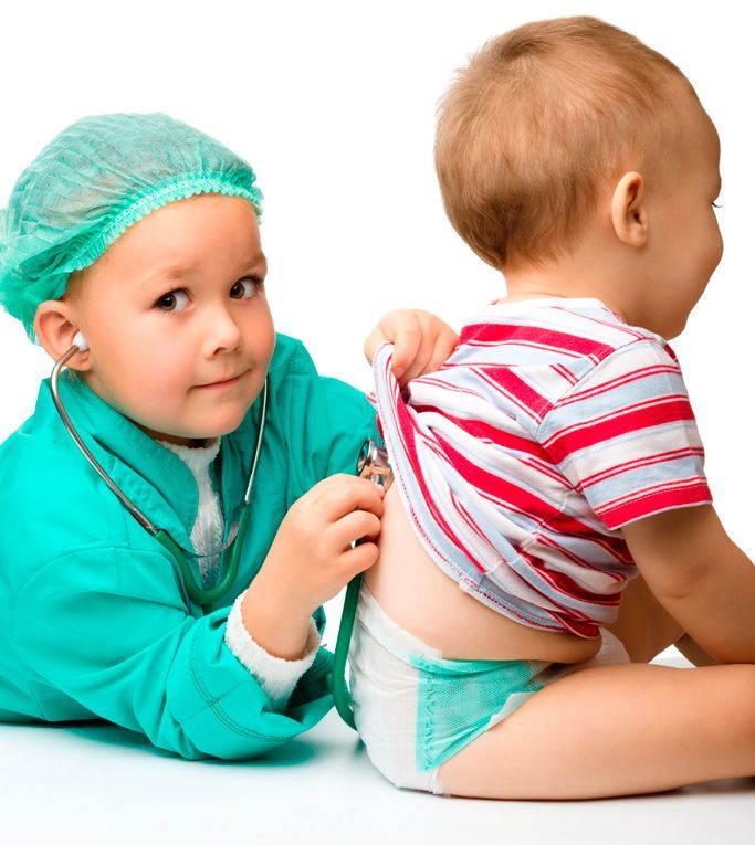 two babies playing doctor with a stethoscope