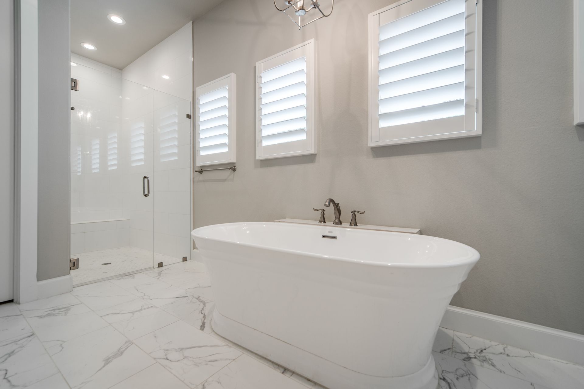 There is a bathtub in the middle of the bathroom.