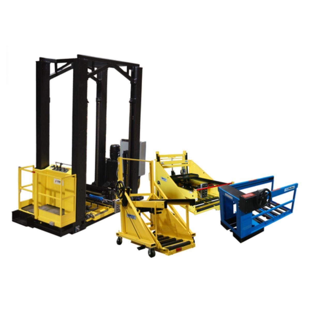 Equipo industrial compuesto por una alta estructura elevadora negra y varios módulos de carga de color amarillo y azul.