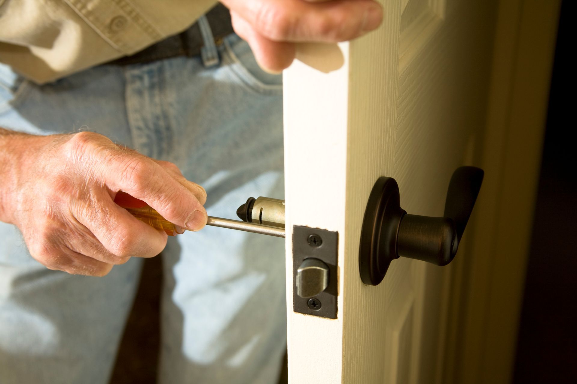 broken apartment door lock needing repair by locksmith