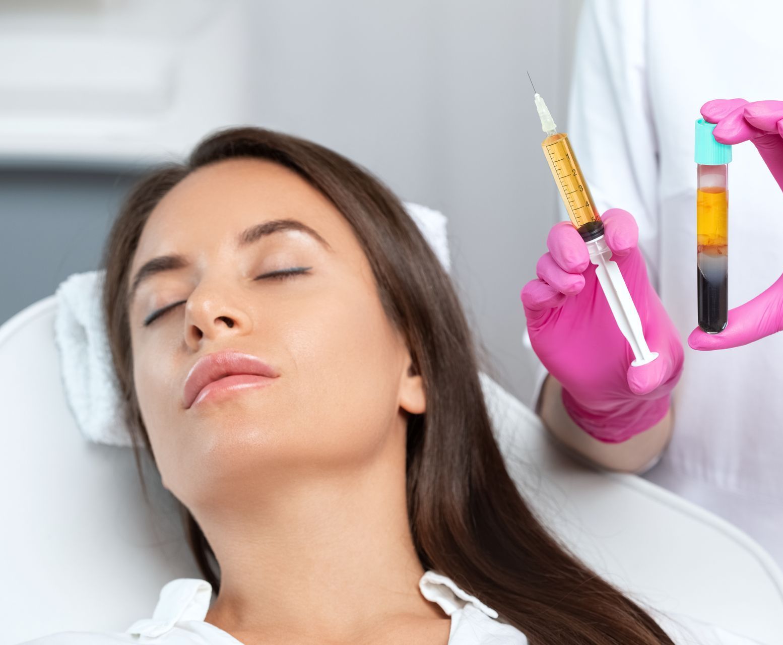 A woman is getting an injection in her face while a doctor holds a syringe.