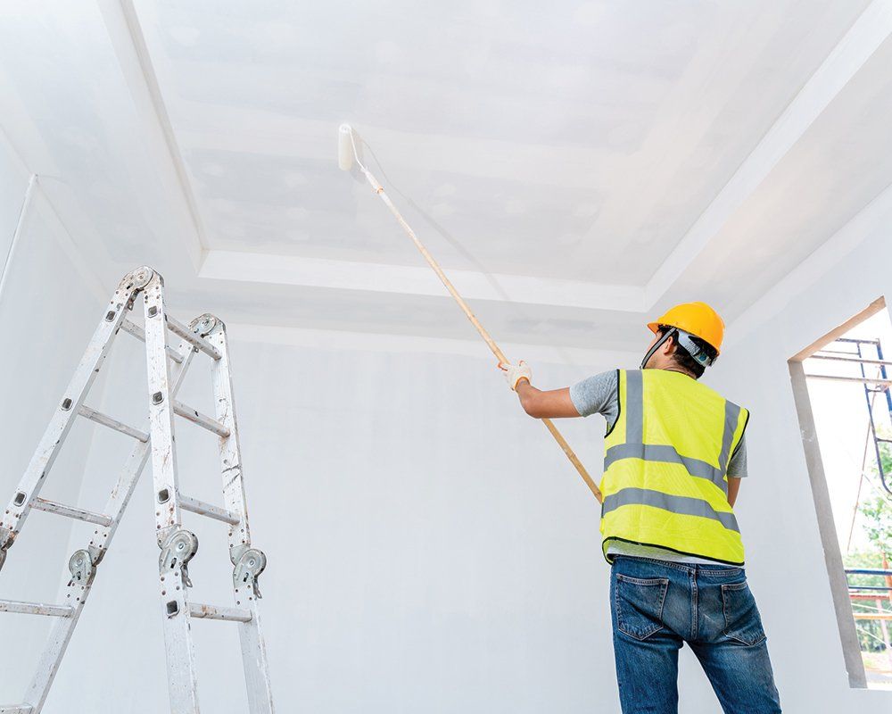 Worker Painting the House Ceiling — Bakersfield, CA — Larry Murphy Painting