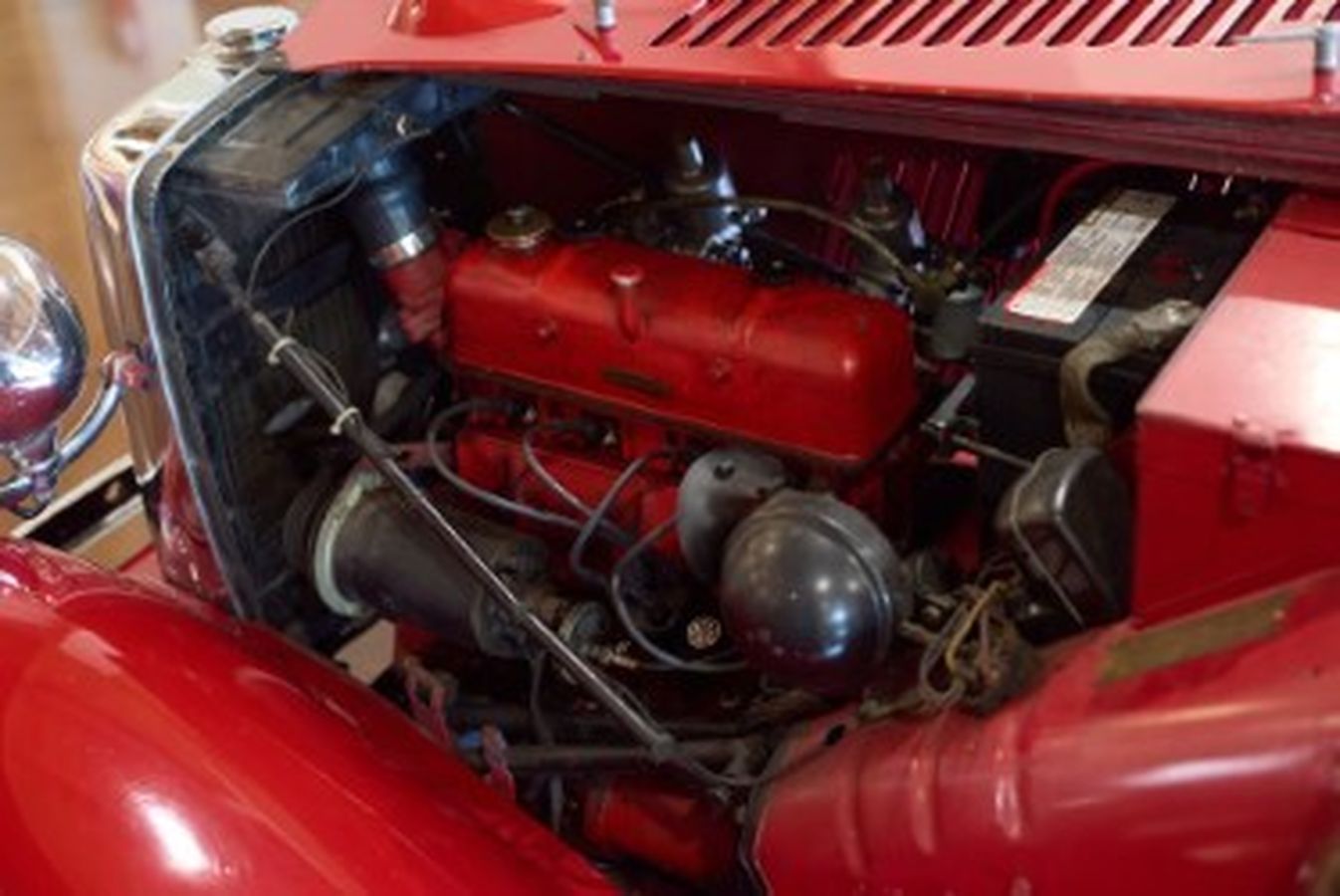 Red engine of a classic car | Sports Car Shop