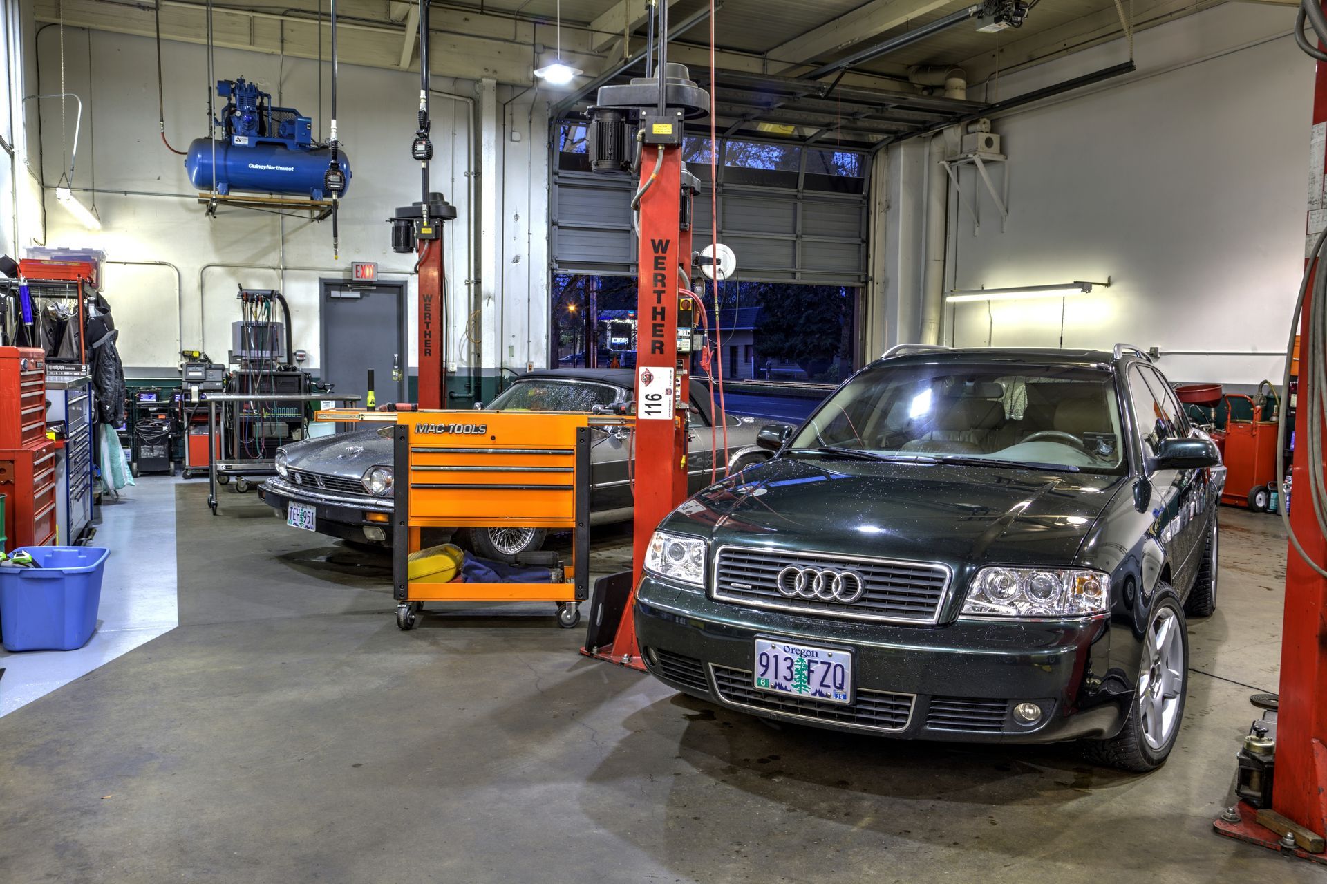 Black Audi in auto repair shop
