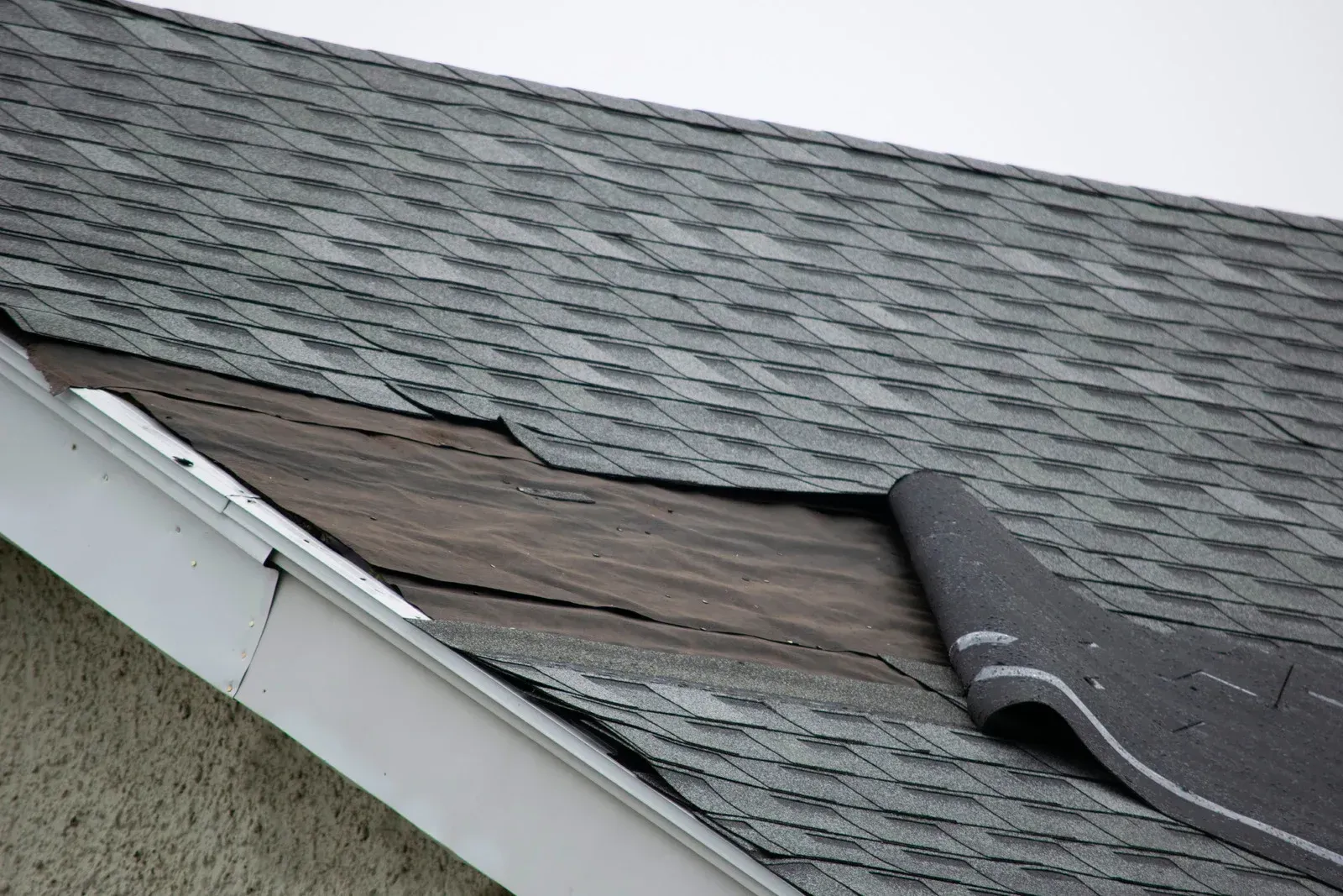 A close up of a roof with a hole in it.