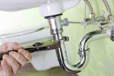 Plumber Fixing Pipe - Plumbing, Heating and Air Conditioning in Blairsville, PA