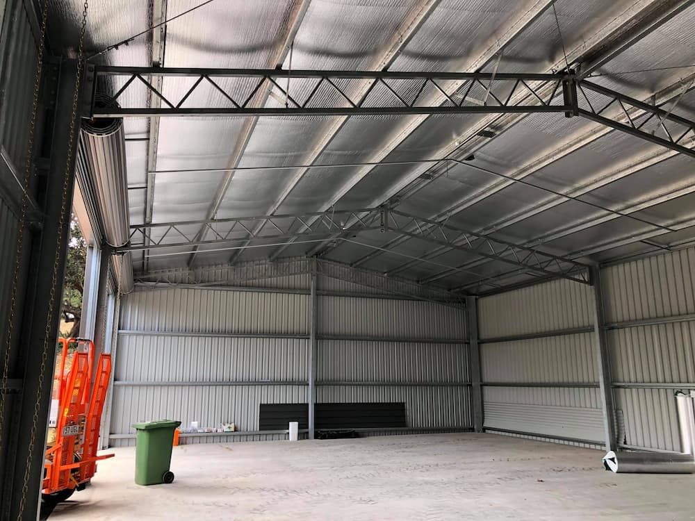 Interior of a Large Metal Shed With Silver Walls, Ceiling, and Beams — Northern Rivers Sheds in South Lismore, NSW