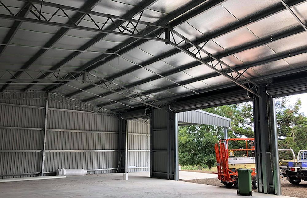 Inside a Metal Shed With Corrugated Walls, Open Doorway and Trusses — Northern Rivers Sheds in South Lismore, NSW