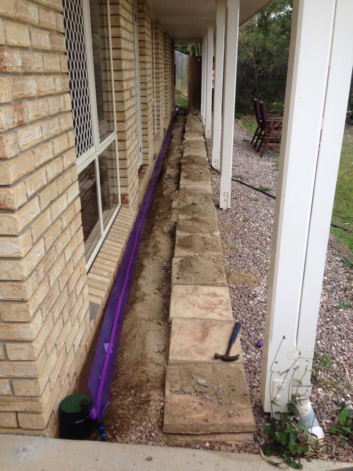 Exterior View of House With a Brick Wall and a Porch With Stone Blocks — All Pest QLD In Sippy Downs, QLD