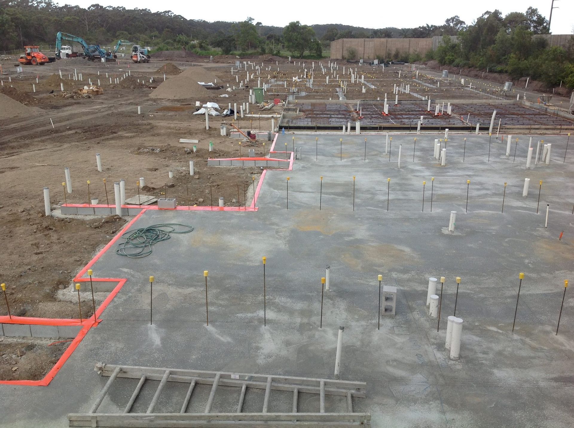 Construction Site With Concrete Slab Plumbing Fixtures — All Pest QLD In Sippy Downs, QLD