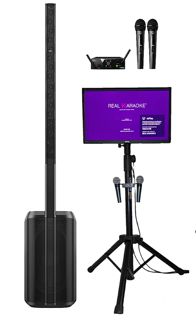 Karaoke setup: Tower speaker, display screen on stand, microphones, and wireless receiver.