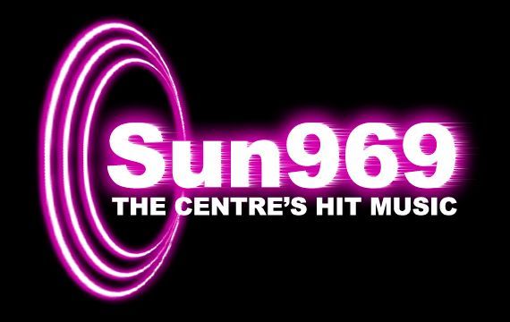 A logo for sun969 the centre 's hit music