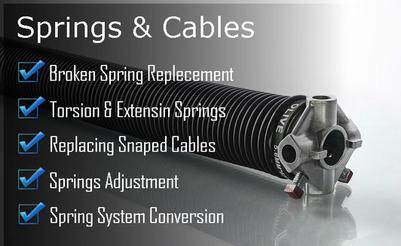 a picture of a spring and cables for a garage door .