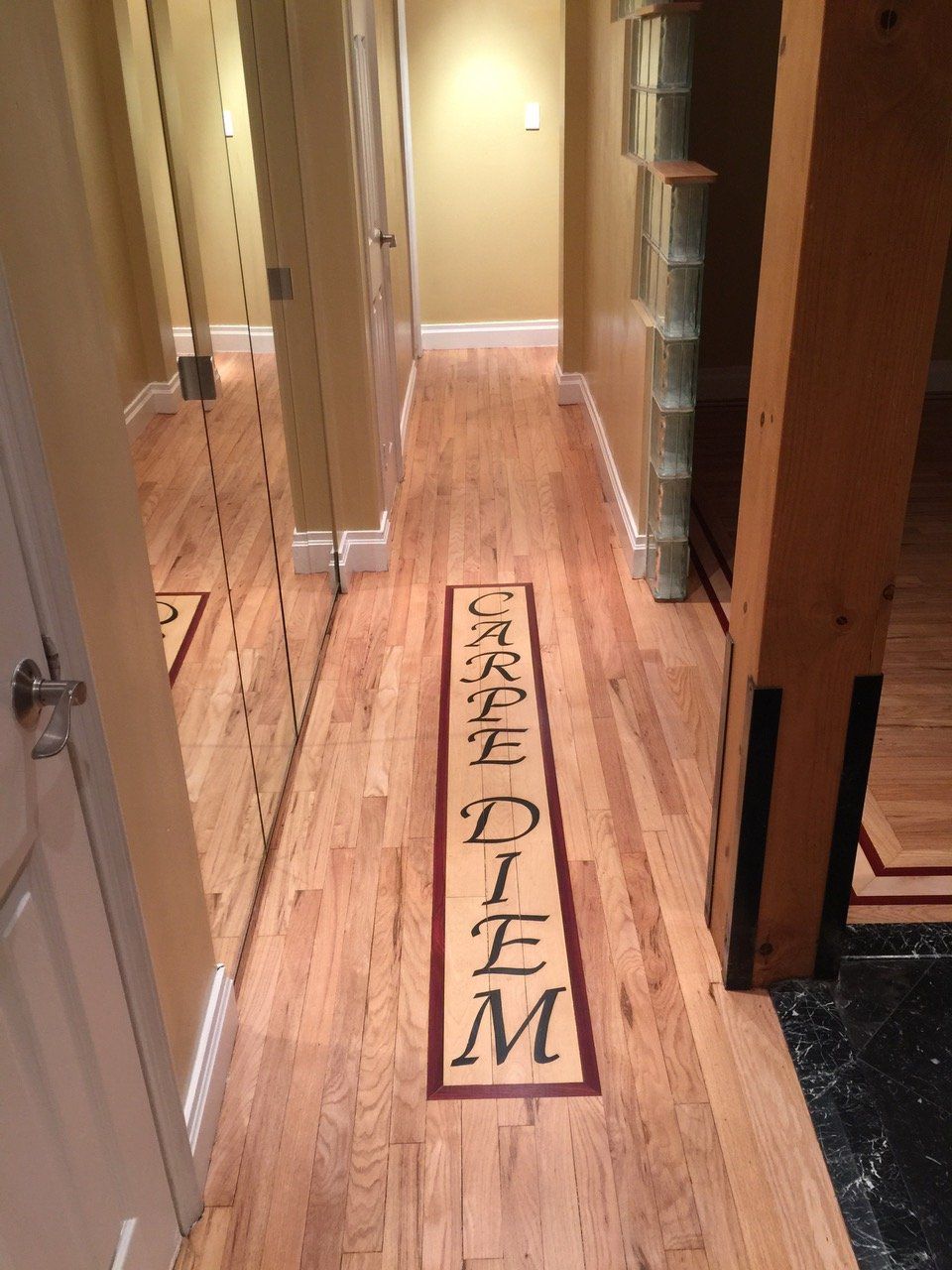 Floor Design — Carpe Diem on Wood Floor in Levittown, NY