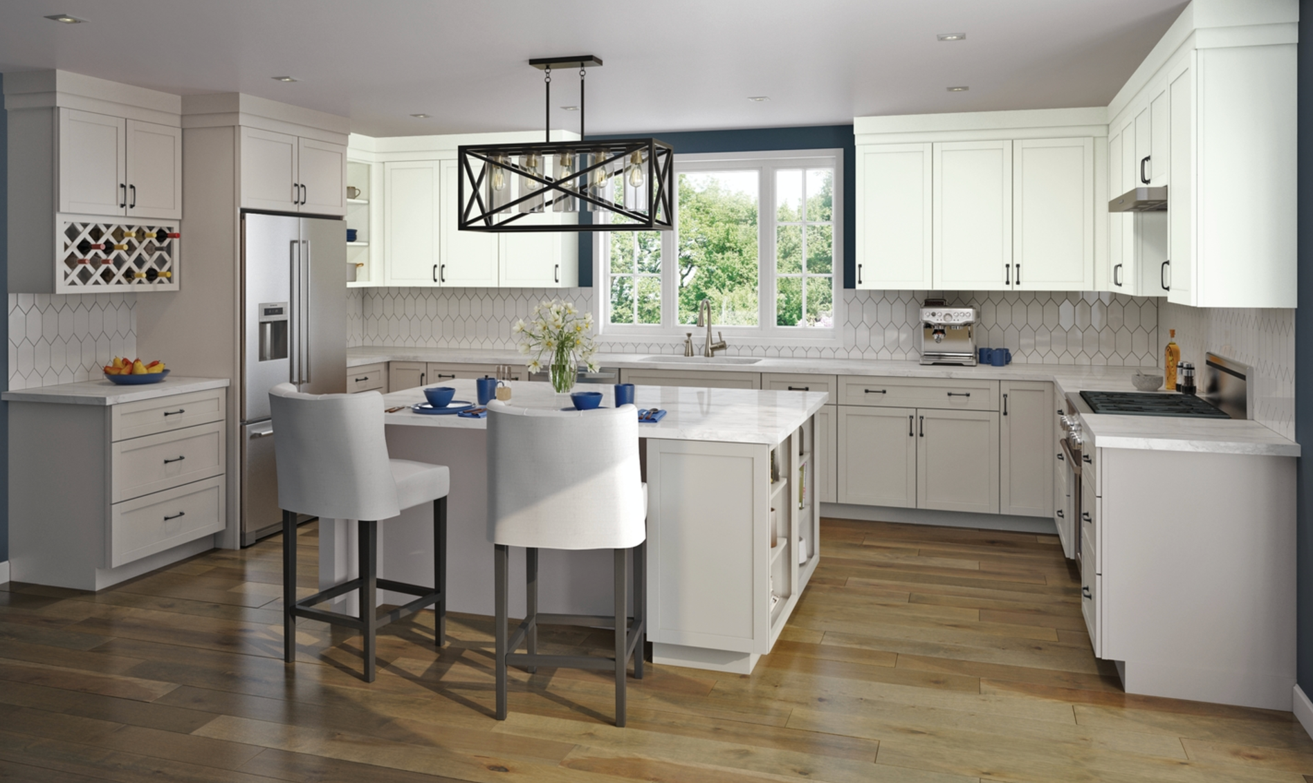 A kitchen with white cabinets , stainless steel appliances , and a large island.