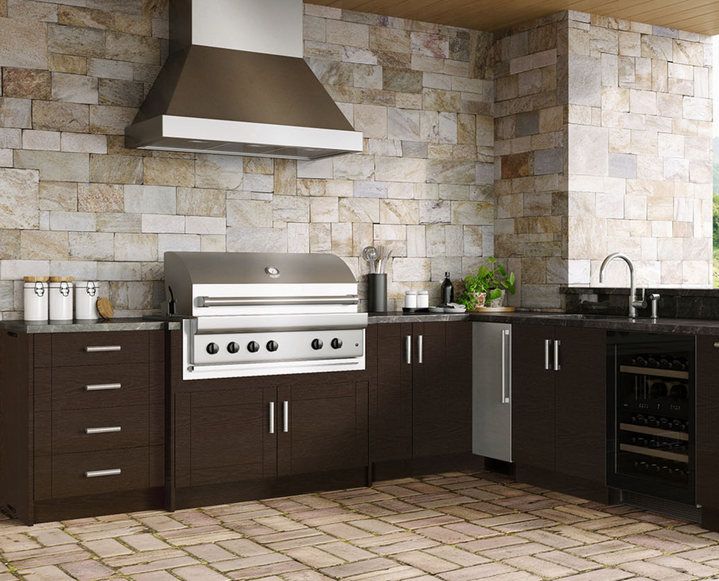 A kitchen with stainless steel appliances and wooden cabinets