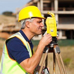A Man Surveying the land - Land Surveying in Mount Joy, PA