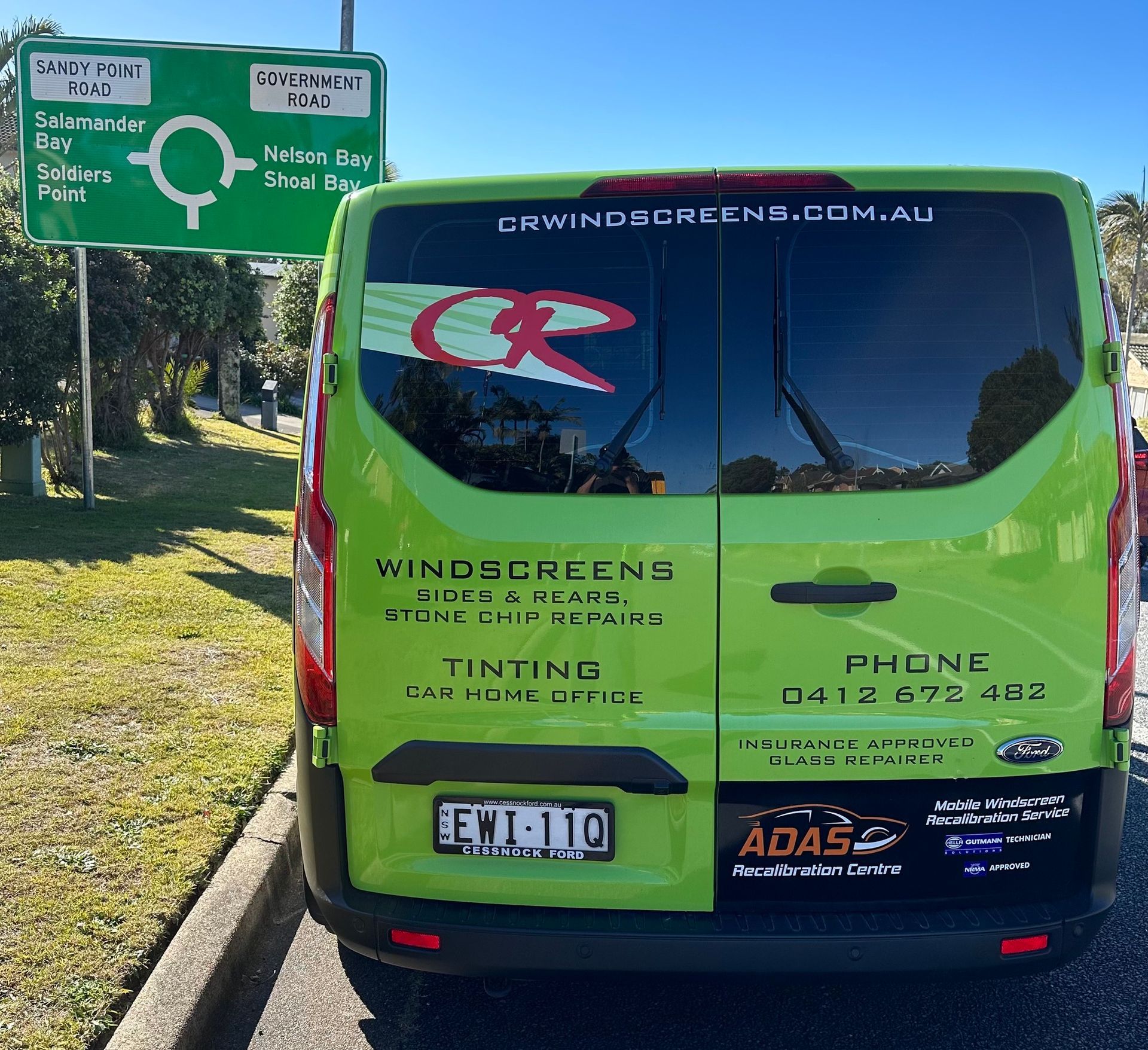 Green Van with Professionally Tinted Windows — Window Tinting Near Me in Australia