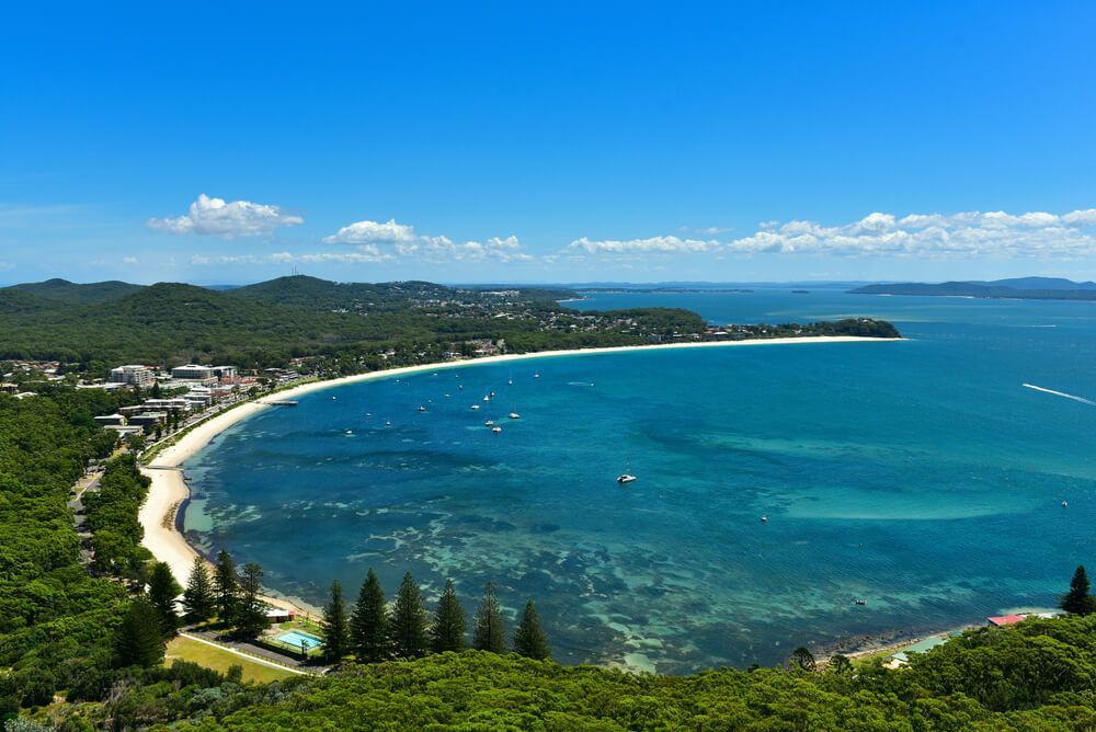 Captivating Port Stephens Beach Scene With Windscreens and Tinting Services — Windscreen Replacement in Port Stephens NSW
