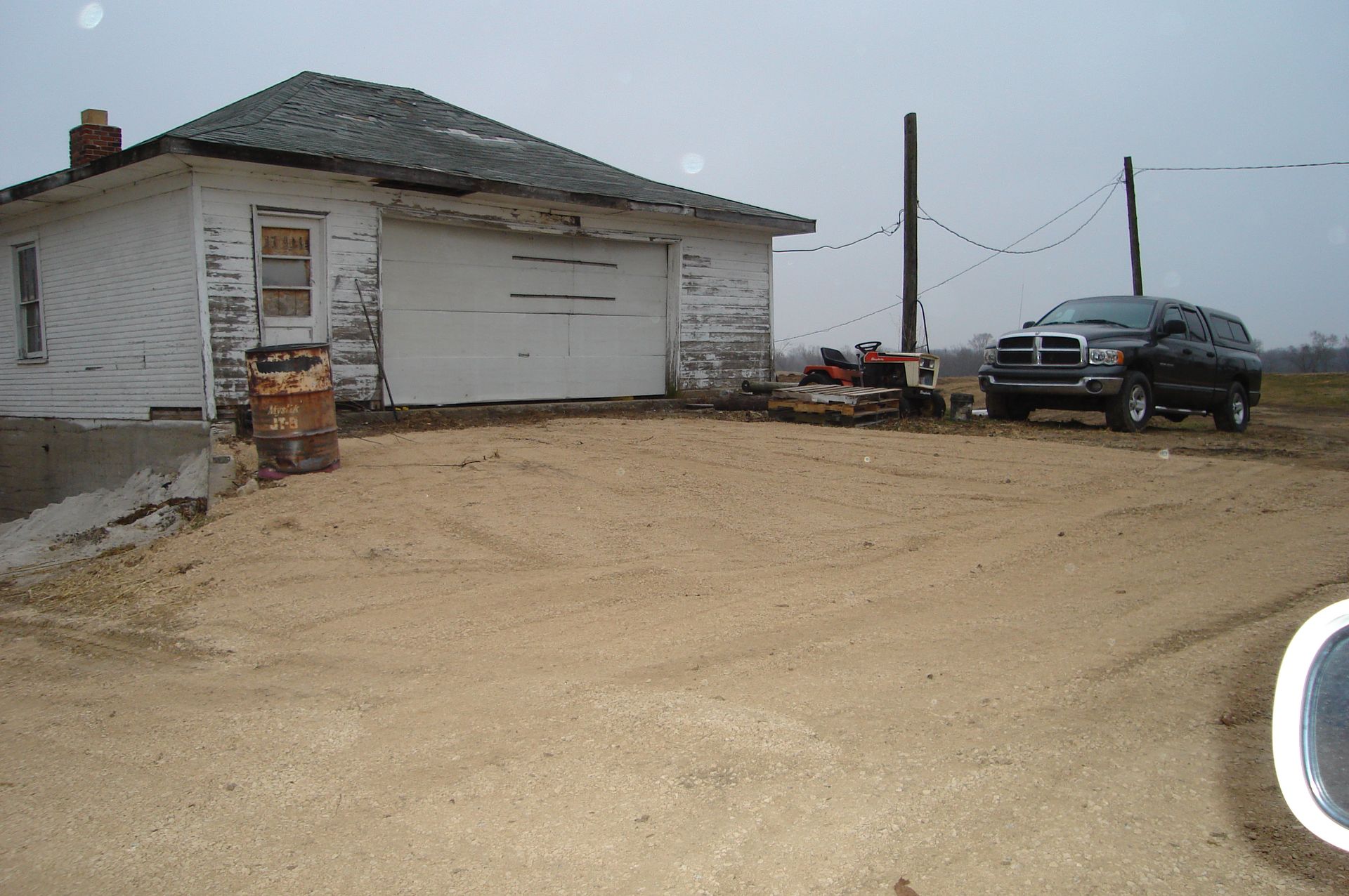 A dodge ram truck is parked in front of a house