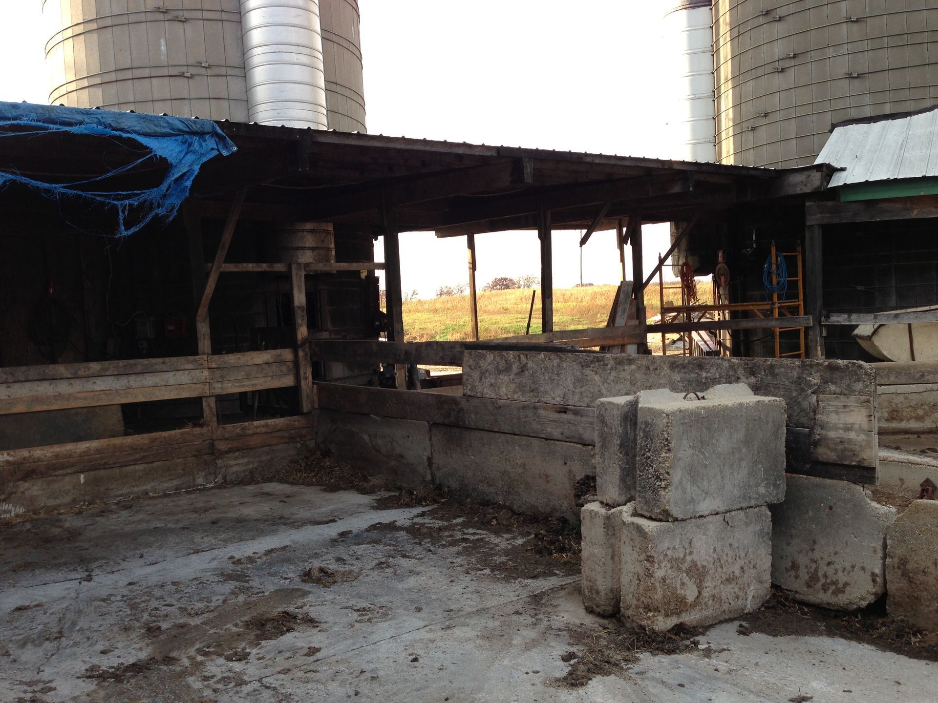 A building with a blue tarp on top of it