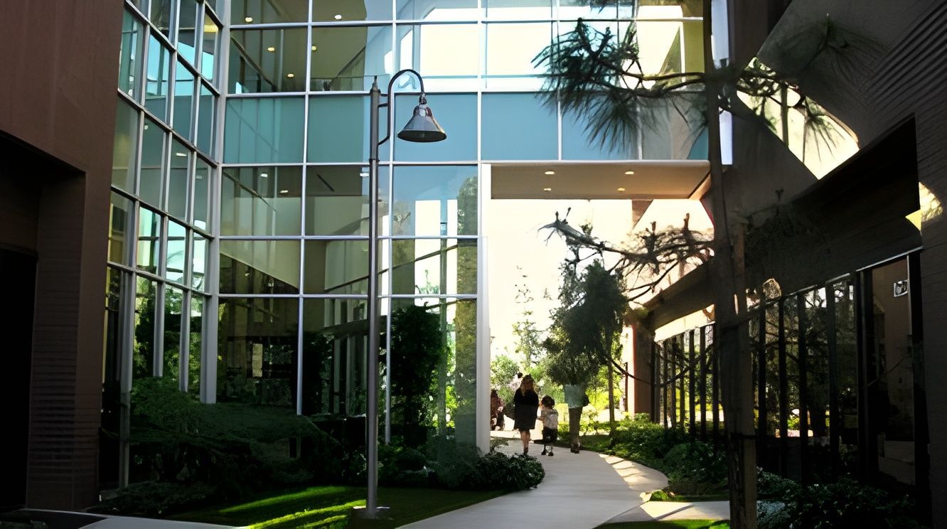 A building with a lot of windows and a walkway