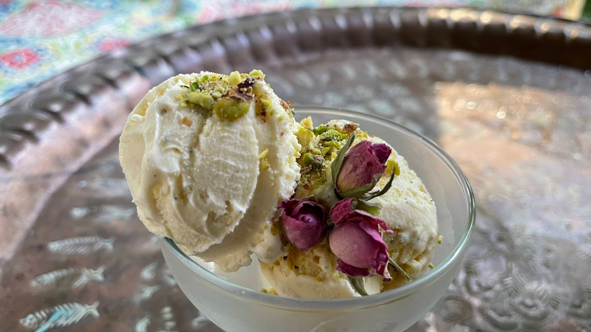 A close up of a creamy bowl of Sheeryakh ice cream in Temorian Reatuarant's container 