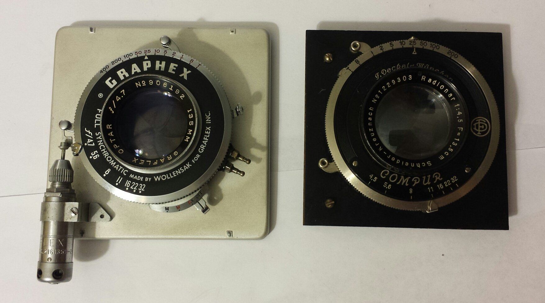 Lenses of the Pacemaker (left) and the Anniversary (right) Speed Graphics, removed from the cameras.