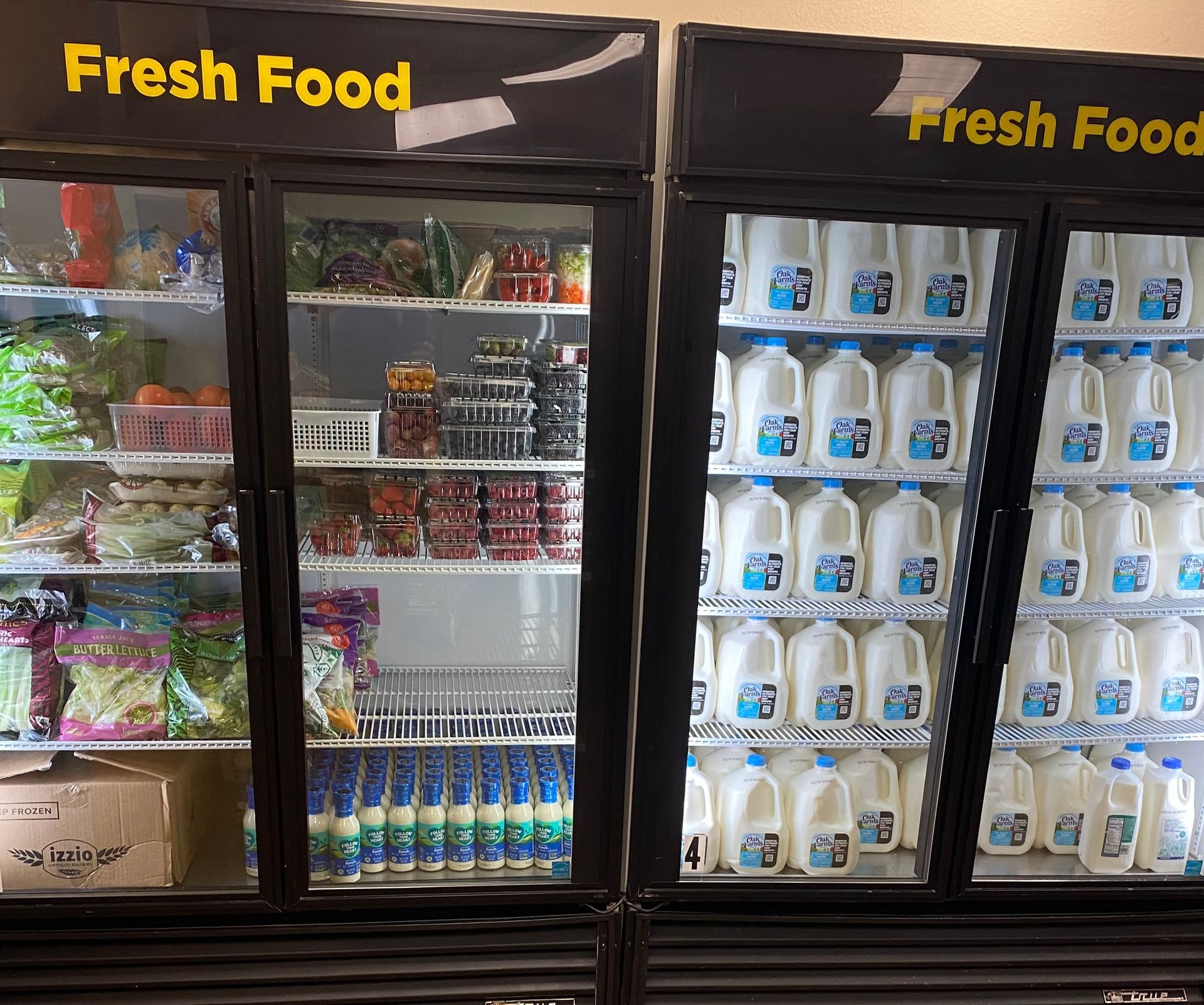 A refrigerator with a sign that says fresh food