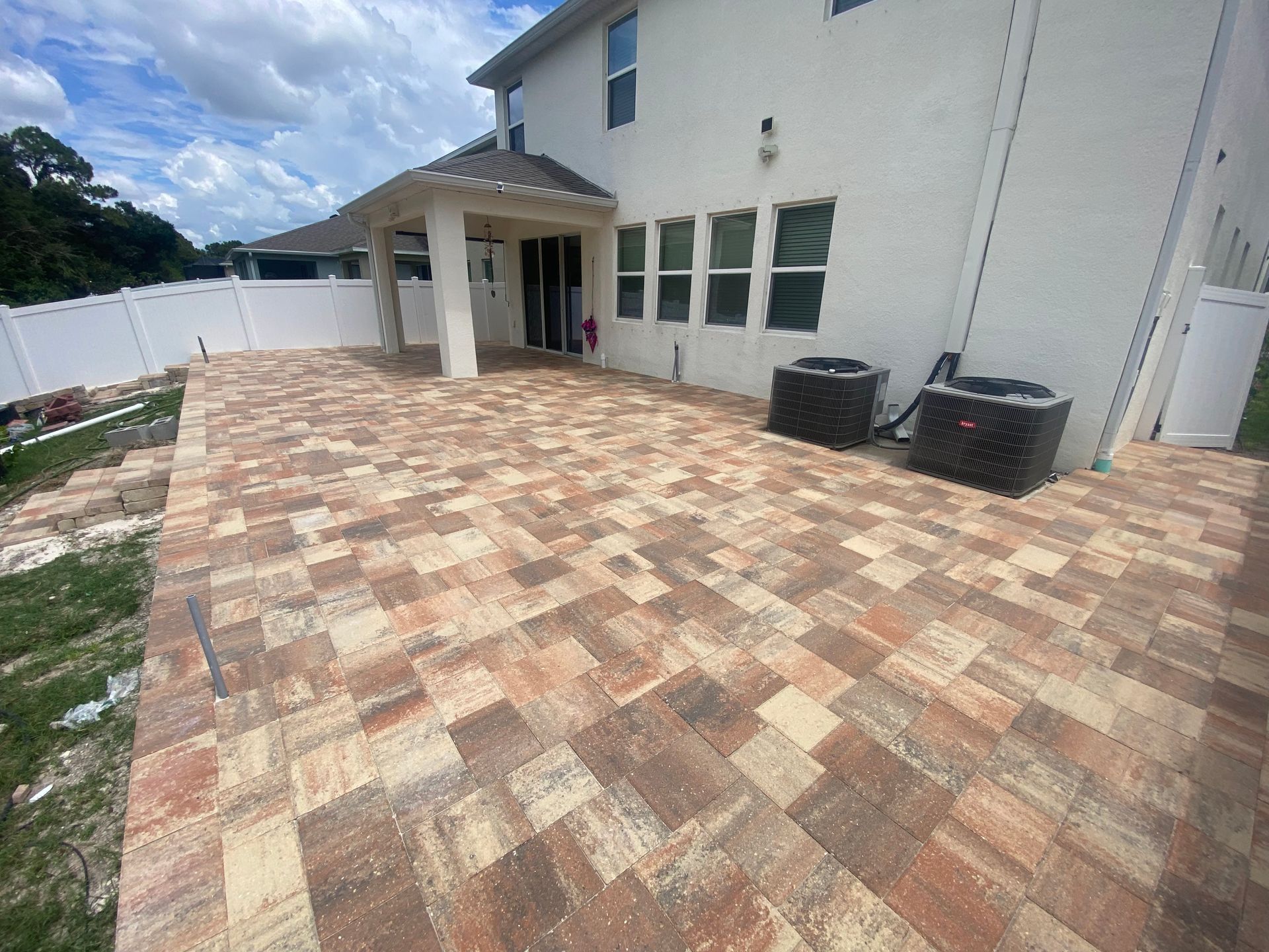Flagstone - Victory in Cream/Orange/Pewter. Patio in Tampa, FL