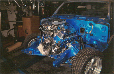 Custom Header Services — Blue  Car Engine in Bakersfield, CA