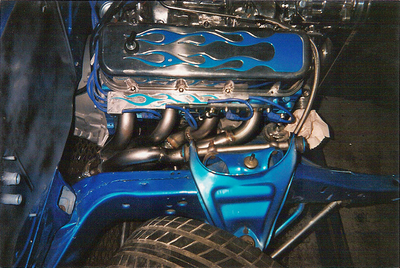 Header Services — Blue  Car Custom Header Installed in Bakersfield, CA