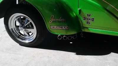 Header Vehicle Services — Green Car Rear Header Installed in Bakersfield, CA