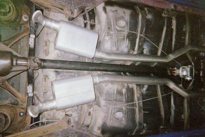 Custom Service Mufflers — Red Land Rover Mufflers in Bakersfield, CA