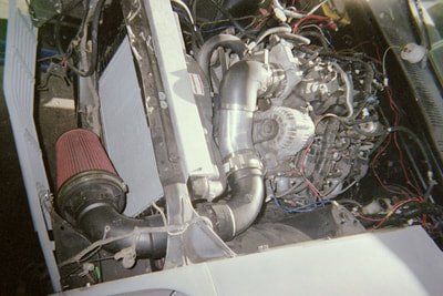 Custom Service Exhaust  and Mufflers — White Car Exhaust System in Bakersfield, CA