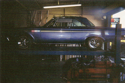 Customize Muffler — Blue Car Side View in Bakersfield, CA