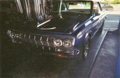 Customize Mufflers — Blue Car Front Side View in Bakersfield, CA