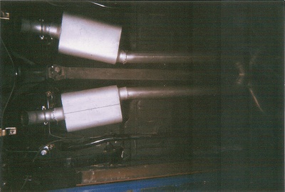 Exhaust Services — Glossy Red Car Mufflers in Bakersfield, CA