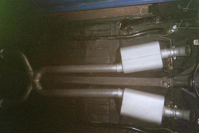 Exhaust and Muffler Customize Service — White Muffler Close Up in Bakersfield, CA