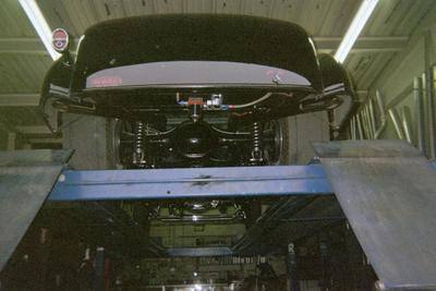 Exhaust Customizable Service — Black Classic Car Rear Undercarriage in Bakersfield, CA