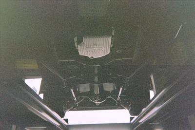 Customizable Service Muffler — Car Undercarriage  Close Up in Bakersfield, CA