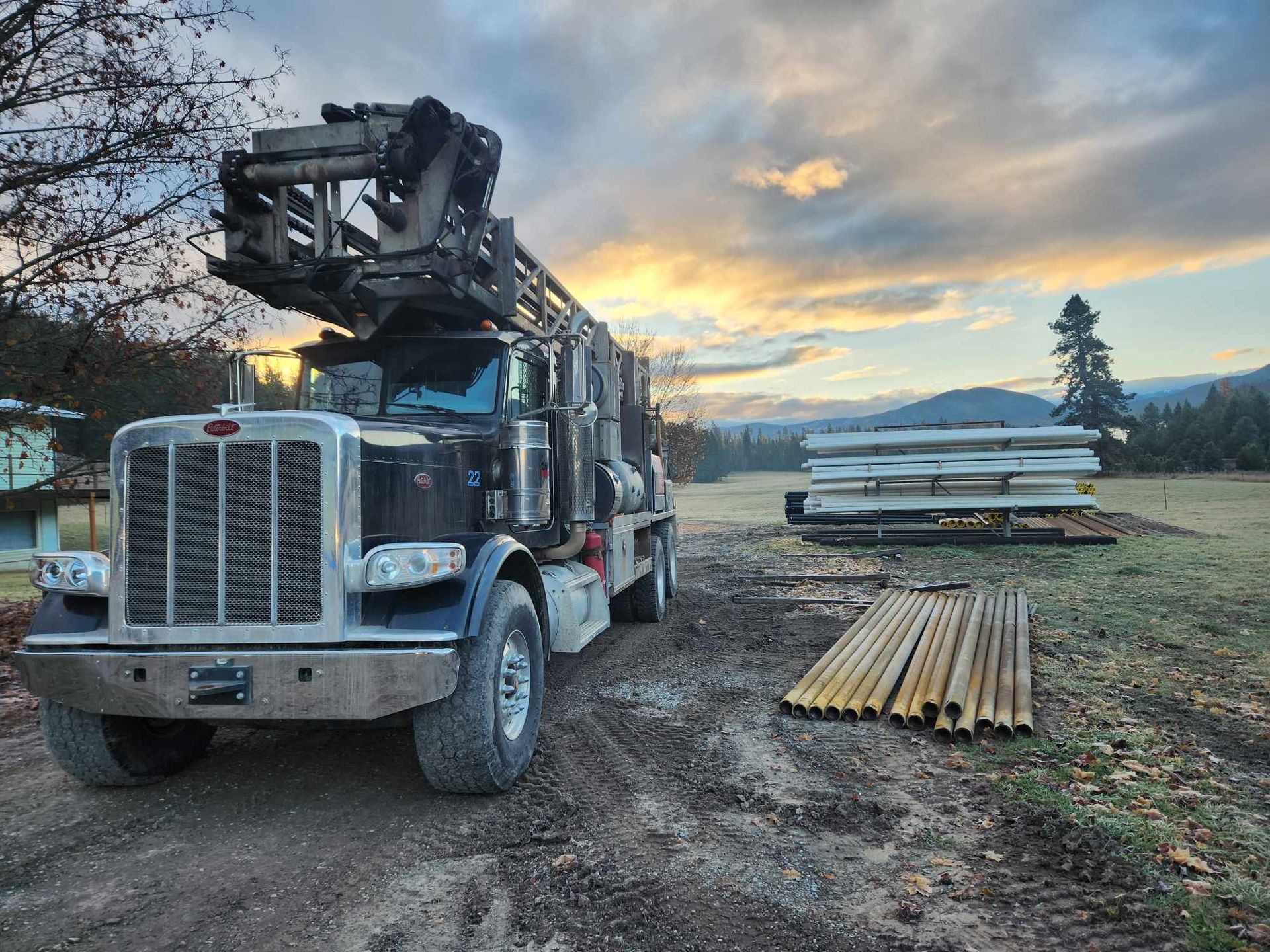 A Semi Truck Is Parked In A Dirt Field | Thompson Falls, MT | North Star Drilling Inc.