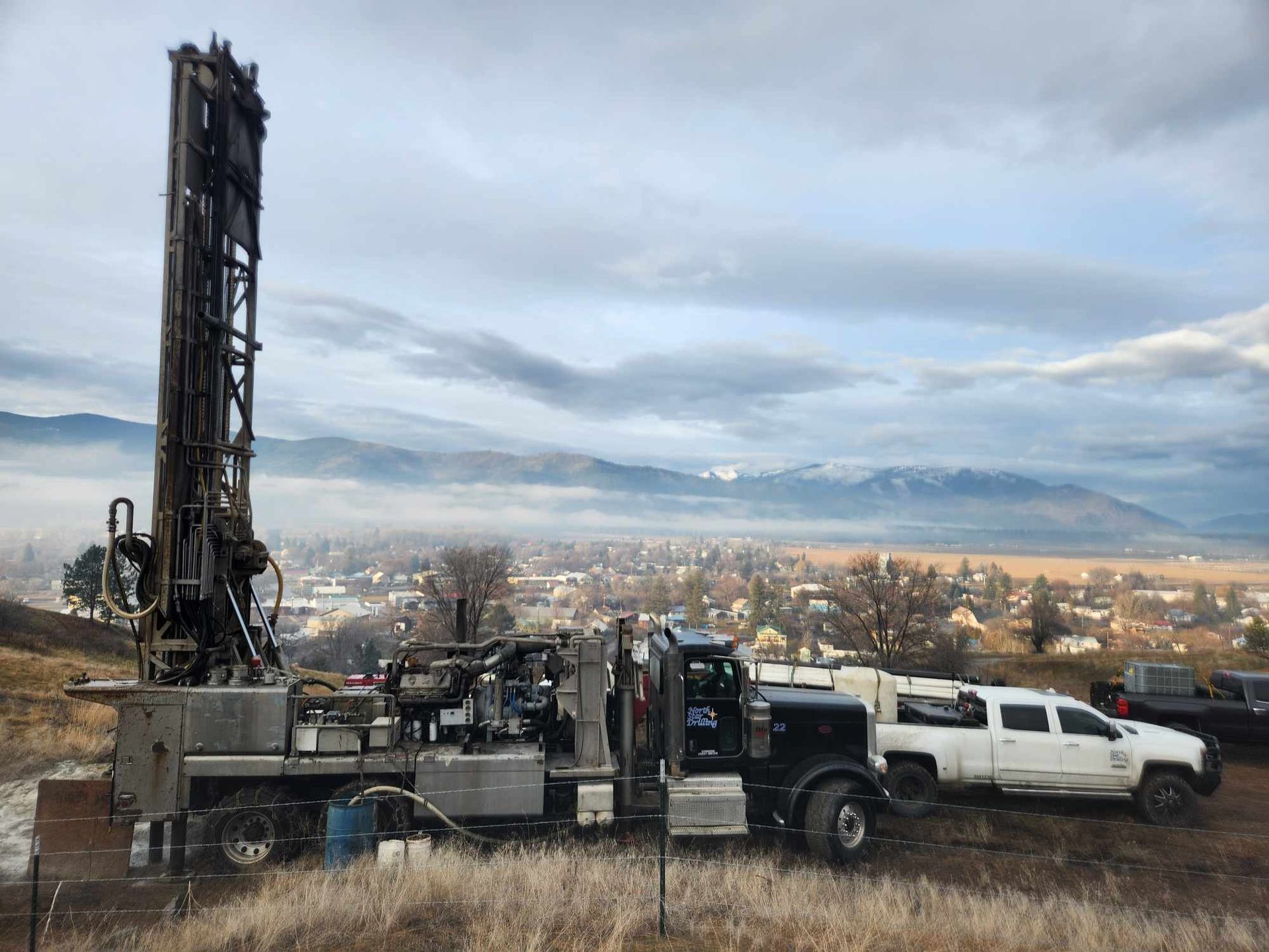 A Truck Is Parked In A Field | Thompson Falls, MT | North Star Drilling Inc.