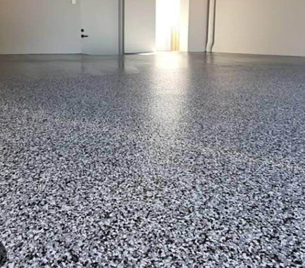 white epoxy flake floor with black and white vinyl flakes