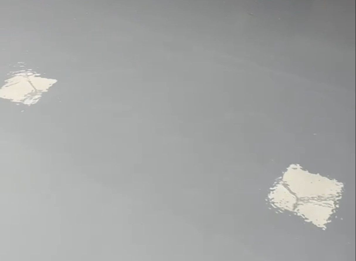 reflective plain grey epoxy floor