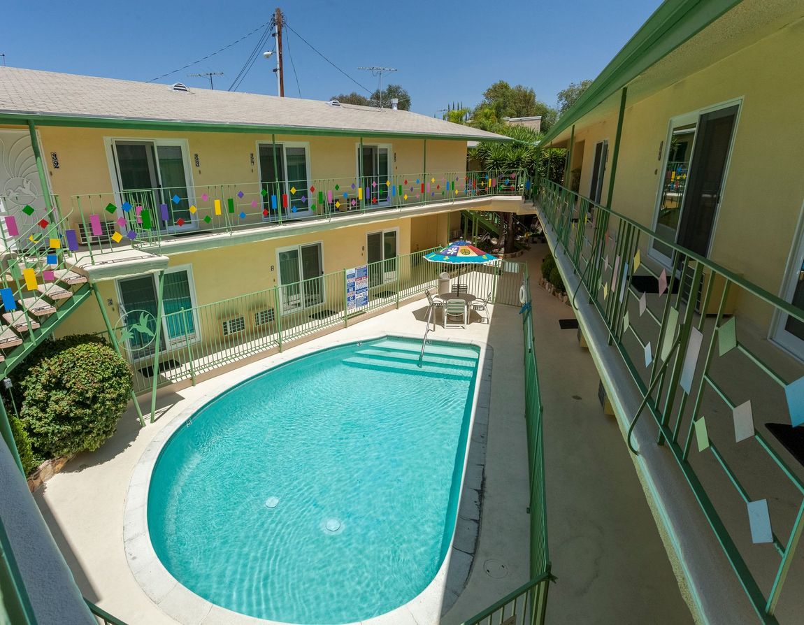A large swimming pool in the middle of a building