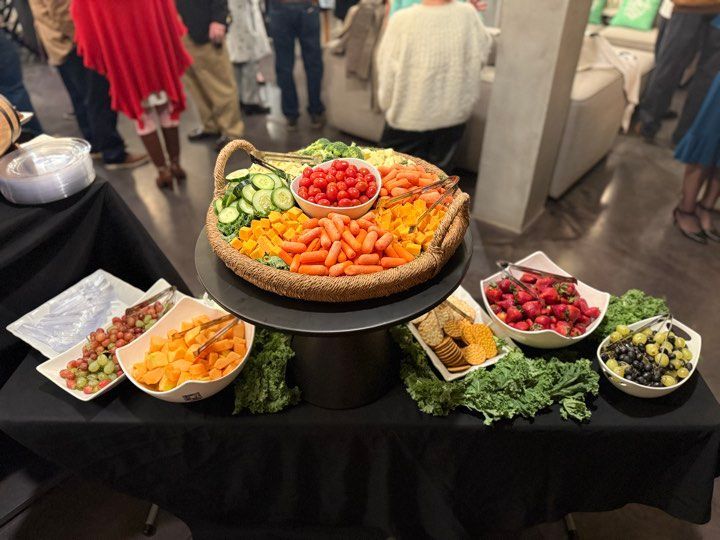 A table with a variety of fruits and vegetables on it.